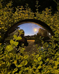 a person is taking a picture in a mirror