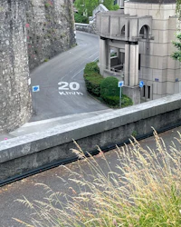 a street with a sign that reads 20 mph